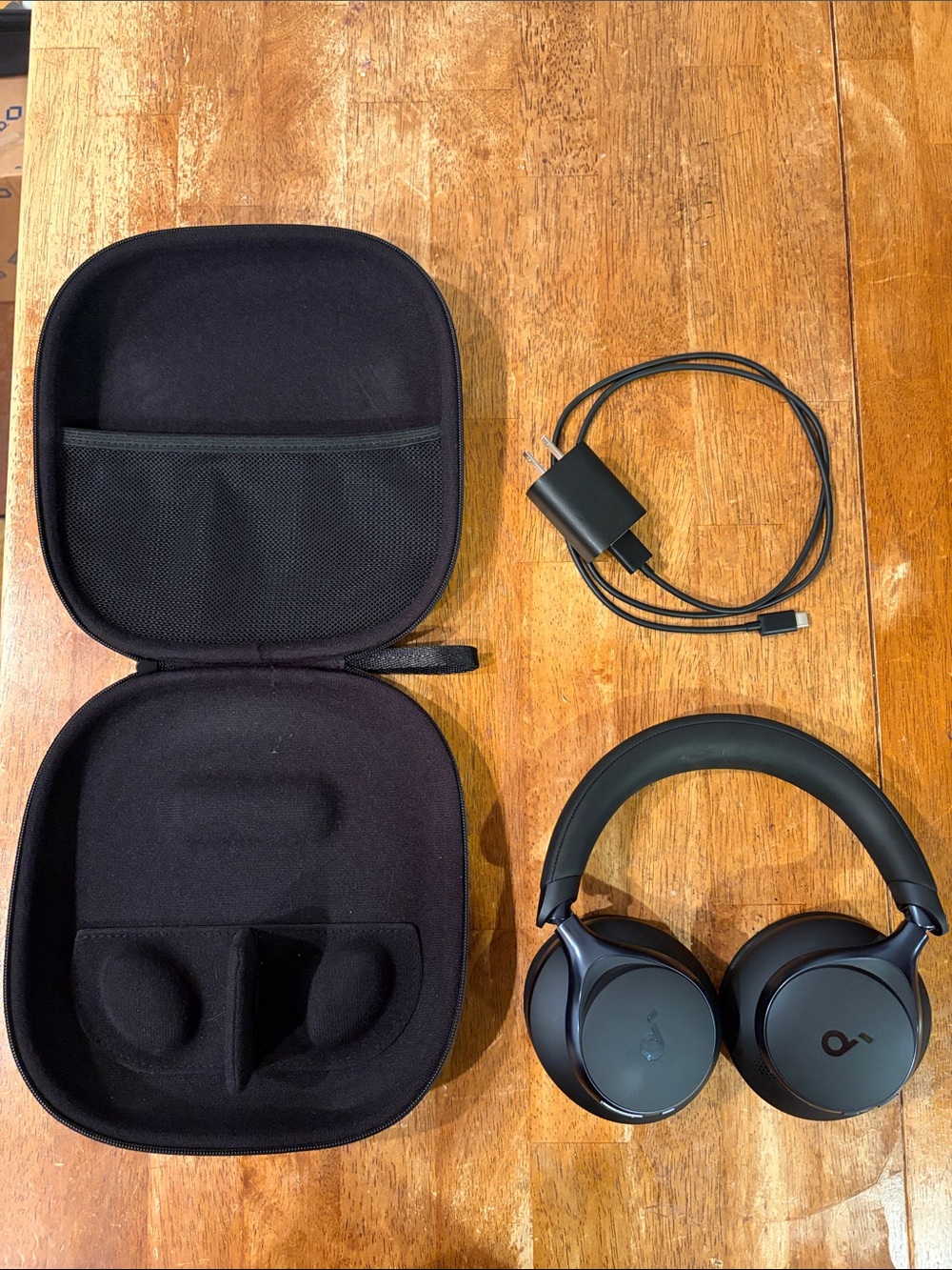 Anker Black Wireless Over-Ear Headphones with Carry Case and Charger.